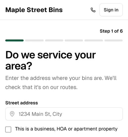 A sign-up page on a phone, asking “Do we service your area?”