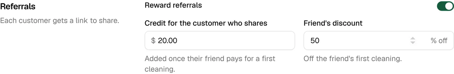 The Referrals settings with Reward referrals on, $20.00 credit for the customer who shares and 50% off for the friend
